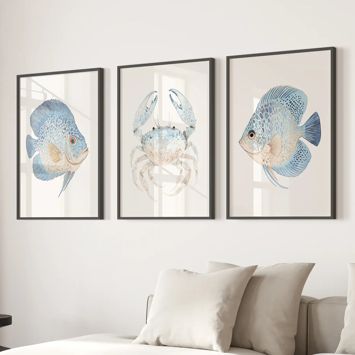 Beach house wall art. Crab and fish marine poster. Black frames over the couch.