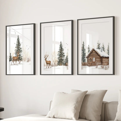 Woodland holiday wall art. Nordic winter chalet wall decor. Black frames over the couch.