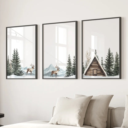 Lodge inspired rustic cabin wall decor. Snowy pine forest posters. Black frames above the sofa.