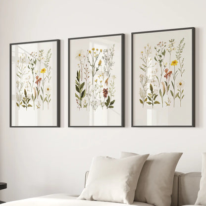Girl nursery decoration. Modern flowers wall art prints. Black frames above the sofa.