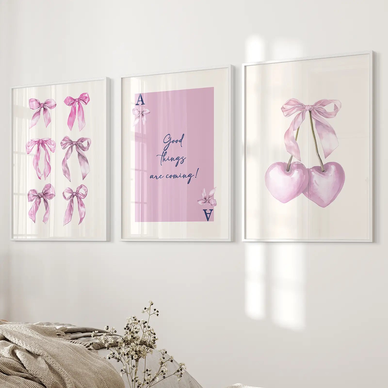 Trendy Pink Bows Wall Art Girly Apartment Decor. White Frames Above the Bed.