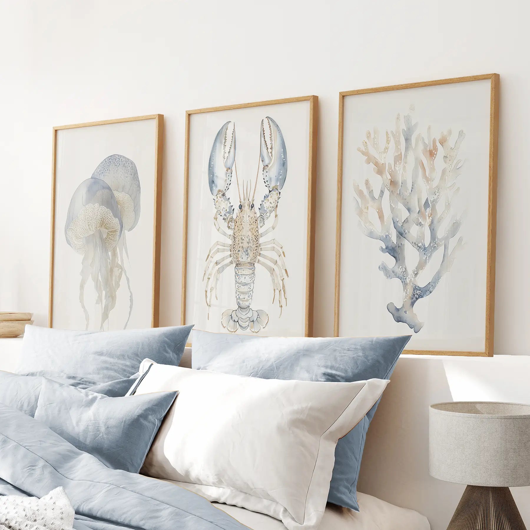 Nautical poster summer cottage wall art. Trendy room decor. Thinwood frames above the bed.