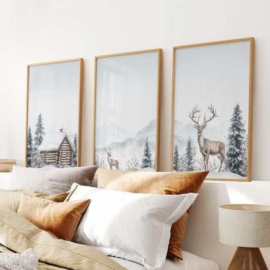 Rustic log cabin and deer prints, woodland wall art decor. Thinwood frames above the  bed.