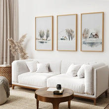 Load image into Gallery viewer, Landscape Set of 3 Piece Winter Watercolor Set. Thin Wood Frames Above the Sofa.
