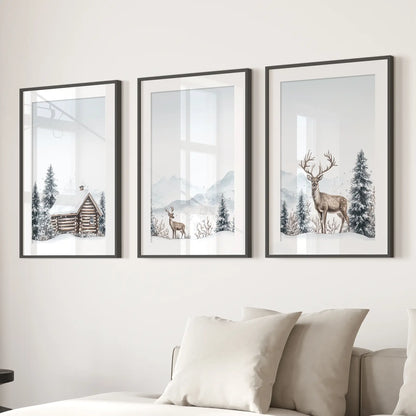 Watercolor rustic winter wall decor featuring cabin, deer, and forest. Black frames with mat for living room.