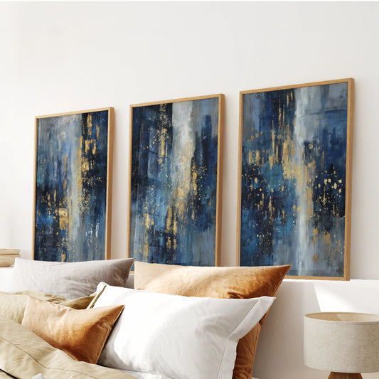 Gold sparkle accents on deep navy, a three-piece wall art set in warm wood frames, installed above the headboard to add luxe contrast in the bedroom.