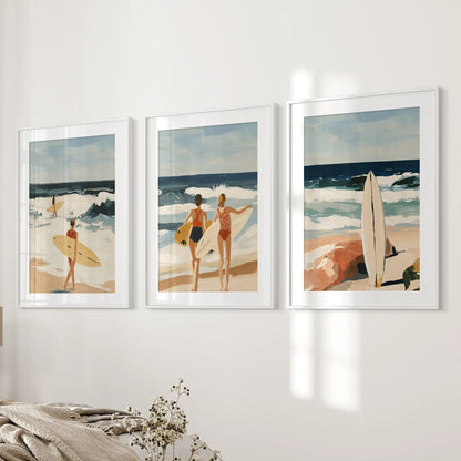 A serene trio of ocean-wave art prints, white-framed and widely matted, steadies the bedroom’s bedside wall with breezy composure.