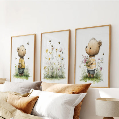 Set of three floral baby animal art prints in wood frames creates a gentle wall art feature over the bed’s headboard in the bedroom.