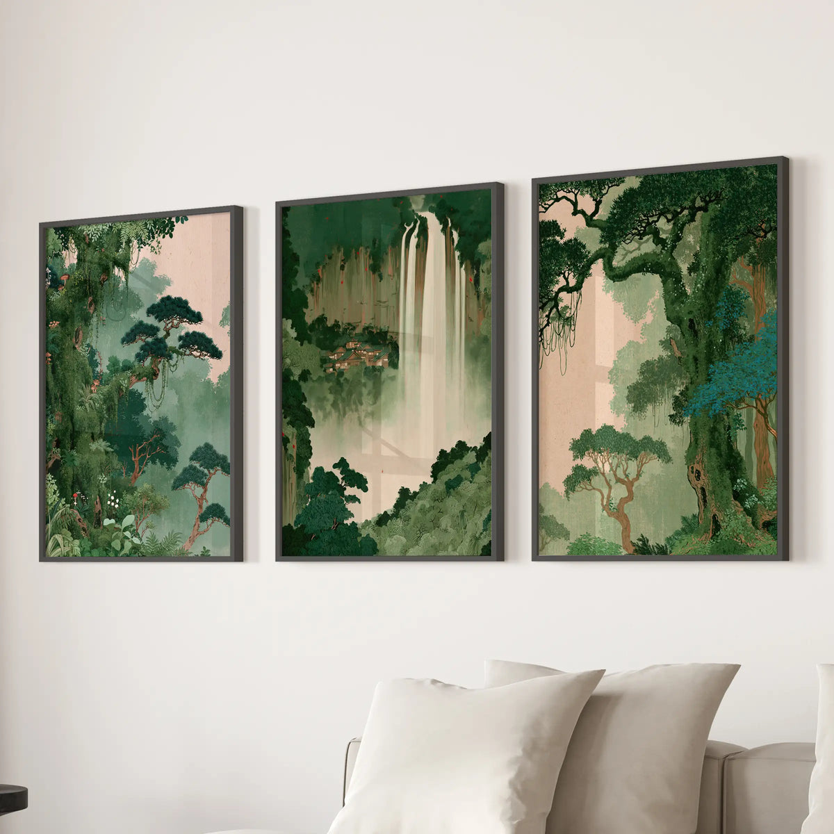 Japanese nature landscape wall art in a three-piece set, shown in black frames over the sofa in a living room with neutral furnishings.