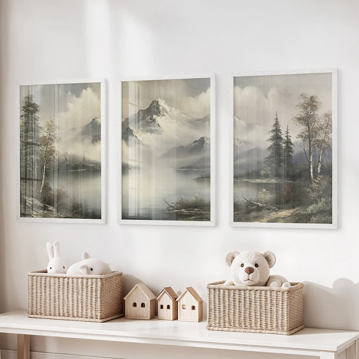 Antique wilderness landscape three-poster wall art set in white frames, arranged above a toy organizer in a kids room.