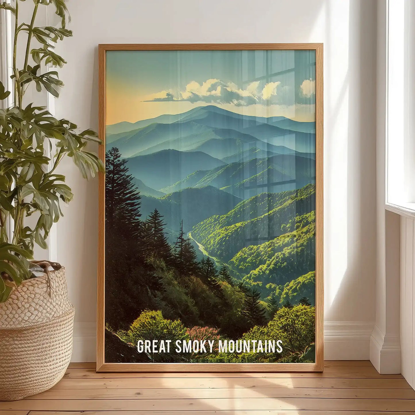 Misty mountain forest individual wall art print, set in a warm oak frame and shown leaning on the floor in the bedroom for a relaxed look.