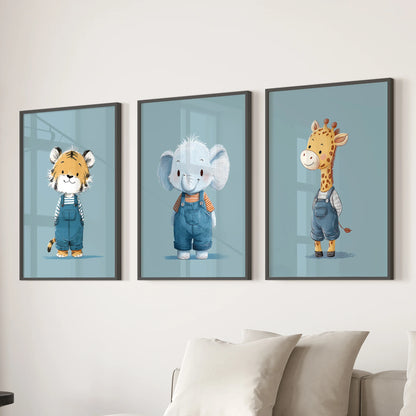 Giraffe, tiger, and elephant trio, set of three wall art prints in black frames, shown above a family room sectional adding a calm blue touch.