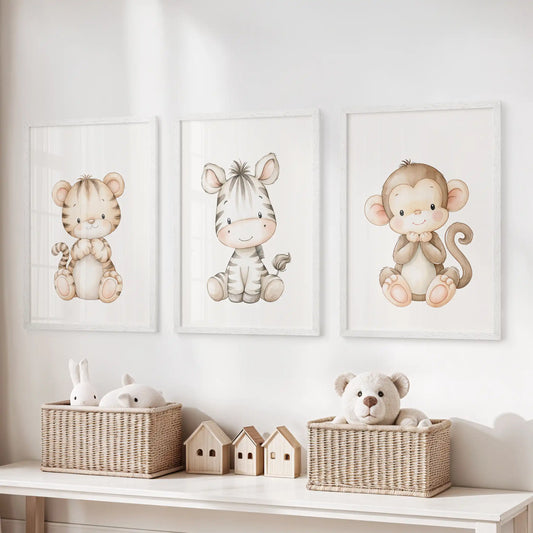 Above a toy storage bench, three white-framed prints show a tiger, zebra and monkey.