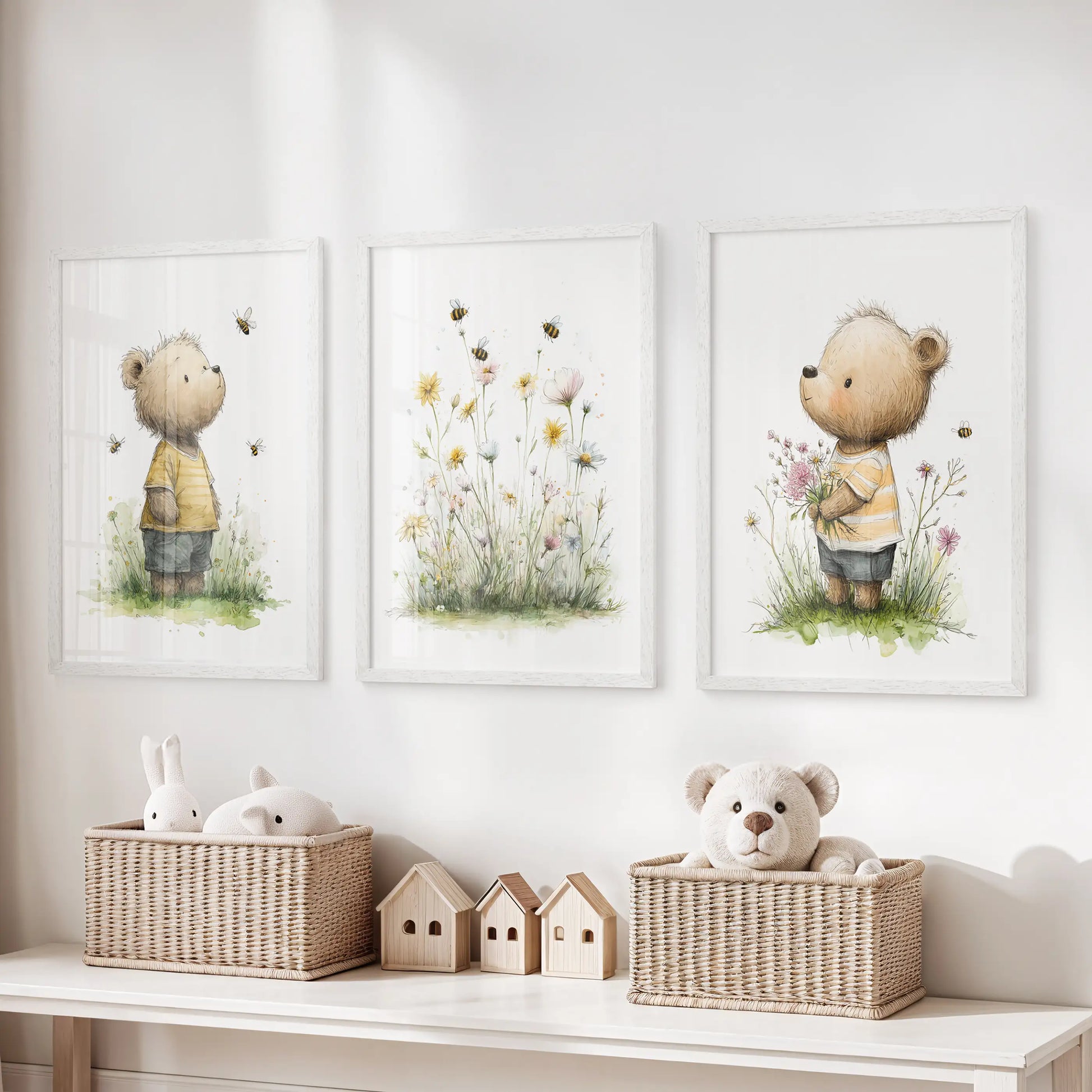 Teddy bear wall art, three-piece set, comes in crisp white frames for a playful look in the playroom, ideal for hanging above a storage bench.