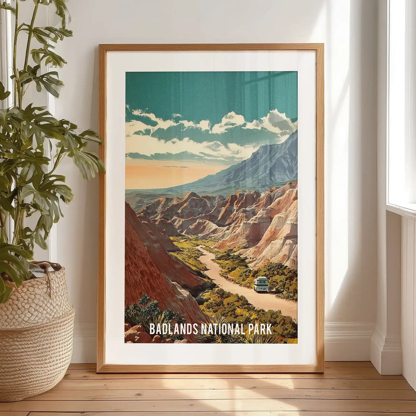 South Dakota pinnacles appear in this single poster, a black-framed and matted print resting casually against the bedroom wall.