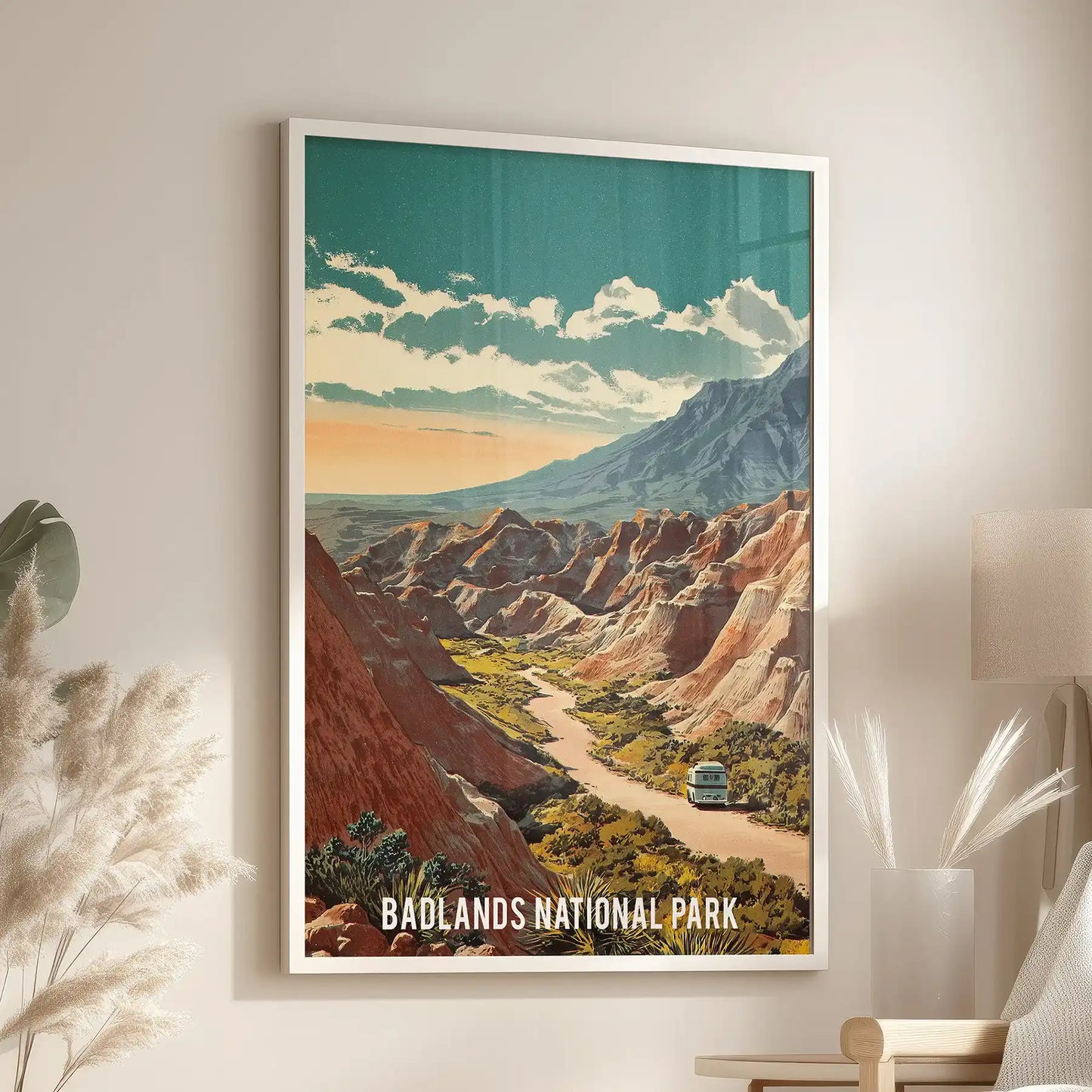 Framed in white, this standalone retro travel poster of the Badlands brings vintage warmth to the living room above a relaxed lounge chair.