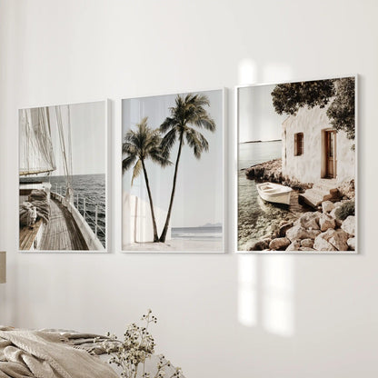 Sailboat wall art set of three in white frames sails into the bedroom, mounted next to the bed wall for a serene nautical note.