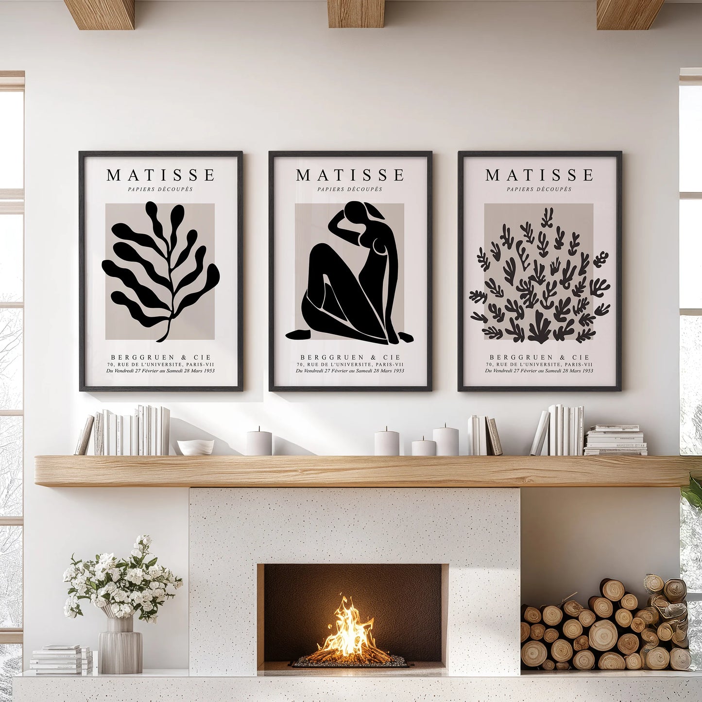 Three framed wall prints with Matisse-style cut-outs create a modern centerpiece above the sitting room fireplace mantel.