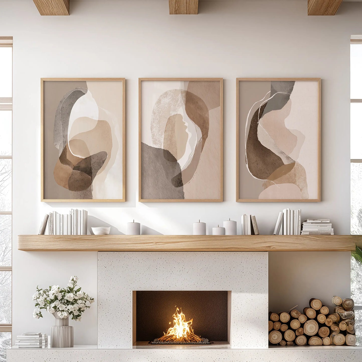 Rustic earthy color blocks three-piece picture set in warm oak frames sits above the mantelpiece, lending understated boho texture to the sitting room.