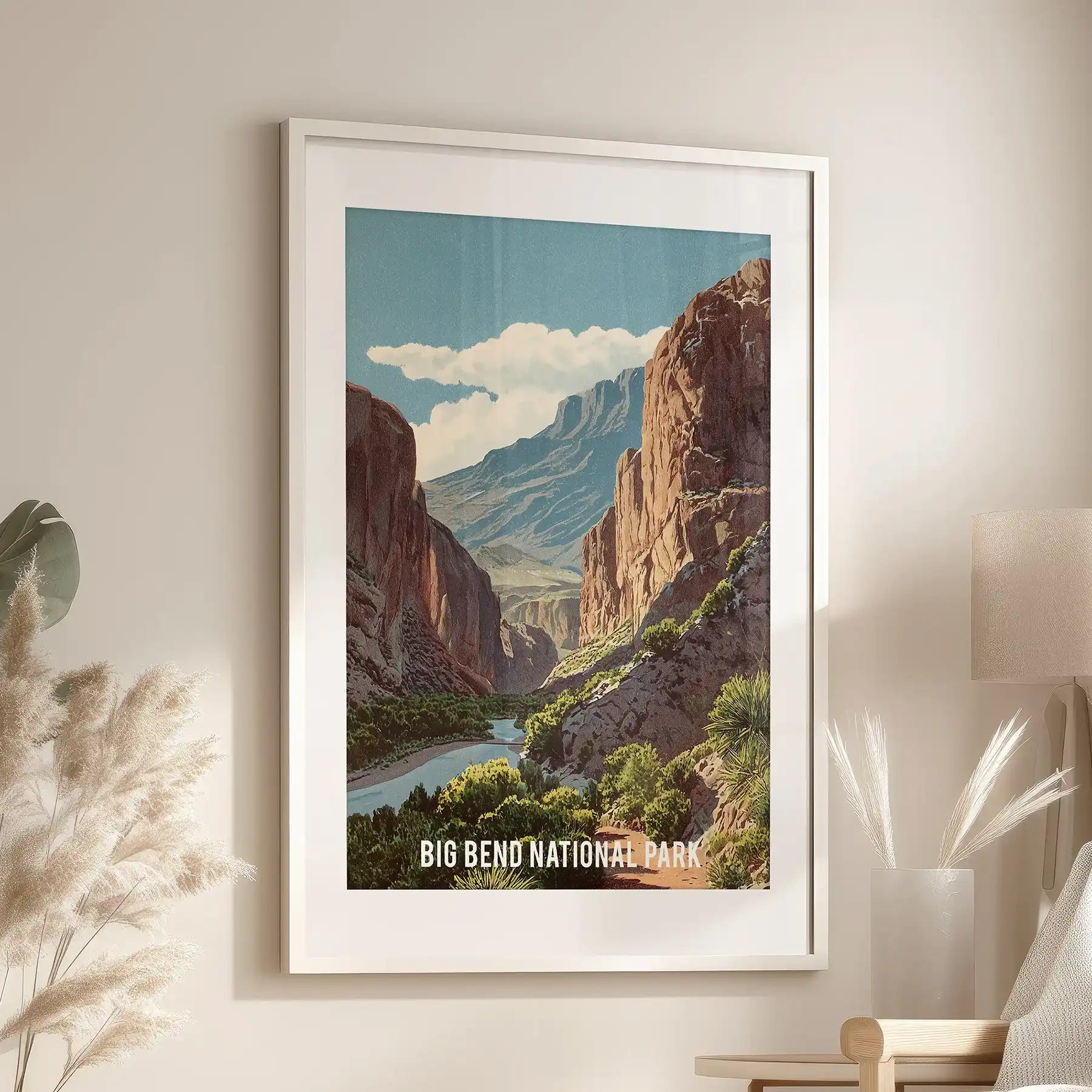 River and canyon vista single wall print, a white matted framed print, mounts above a lounge chair in the family room for a bright, airy accent.