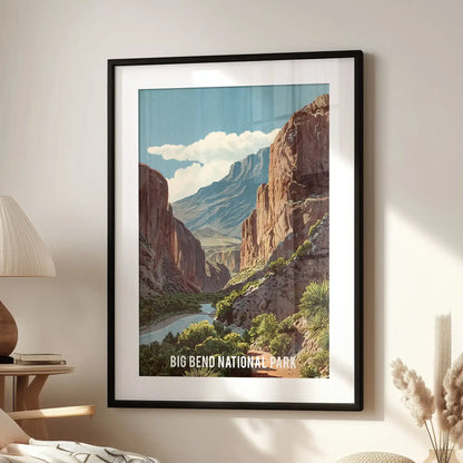 A single Rio Grande canyon poster framed in black with a mat rests near an accent chair, its blue-brown tones adding a crisp travel feel.