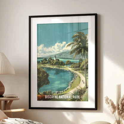 Biscayne Bay shoreline wall picture print, matted in a black frame, hangs above a family-room lounge chair with a vintage tropical coast palette.