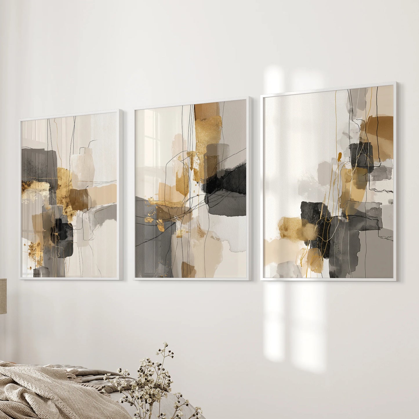 Watercolor wash abstractions, a 3-piece wall art triptych in slim white frames, flow near the bed wall and keep the bedroom feeling airy and modern.