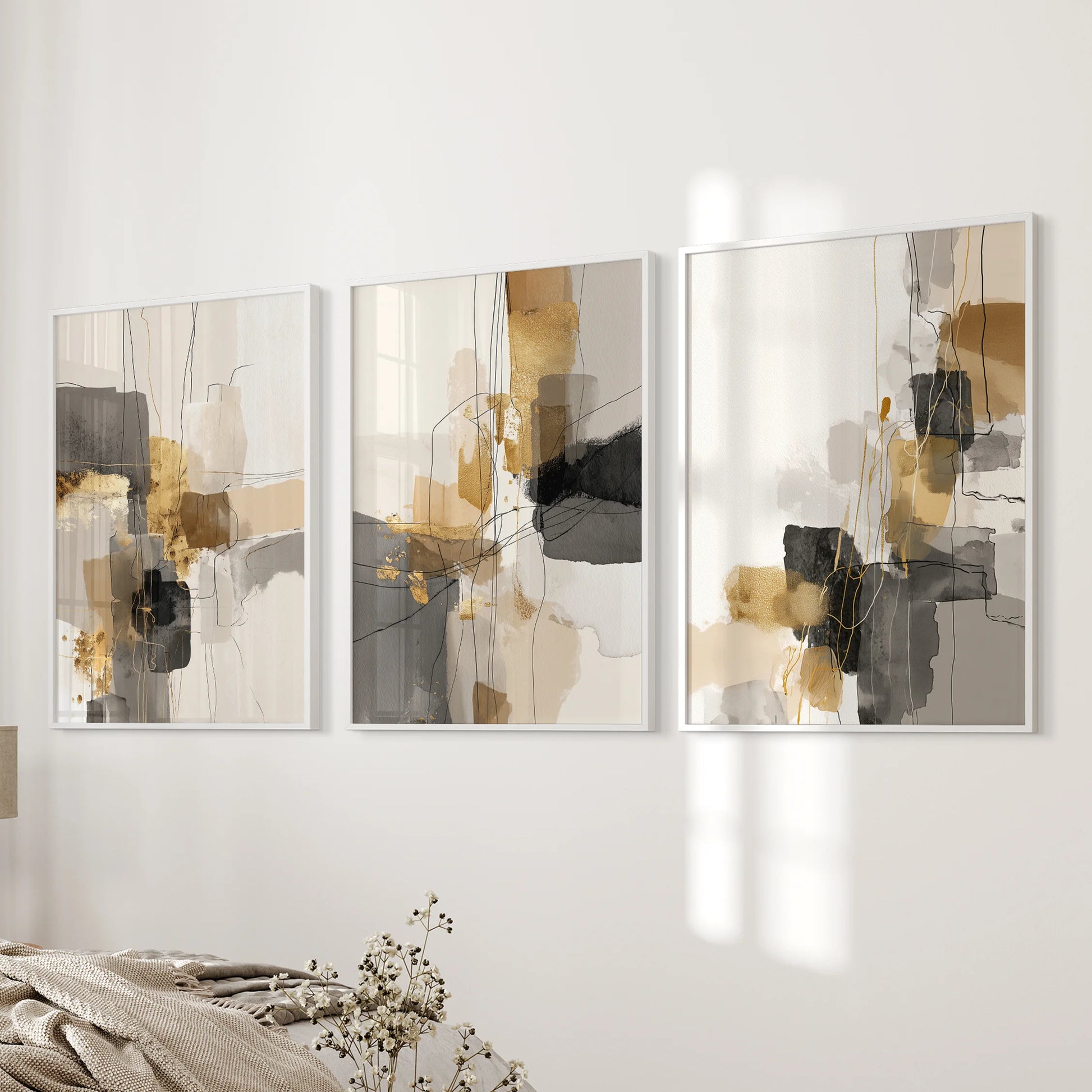 Watercolor wash abstractions, a 3-piece wall art triptych in slim white frames, flow near the bed wall and keep the bedroom feeling airy and modern.