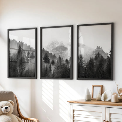 Three black-framed forest art prints with a hazy tree line bring calm style to a playroom wall above a chest of drawers.