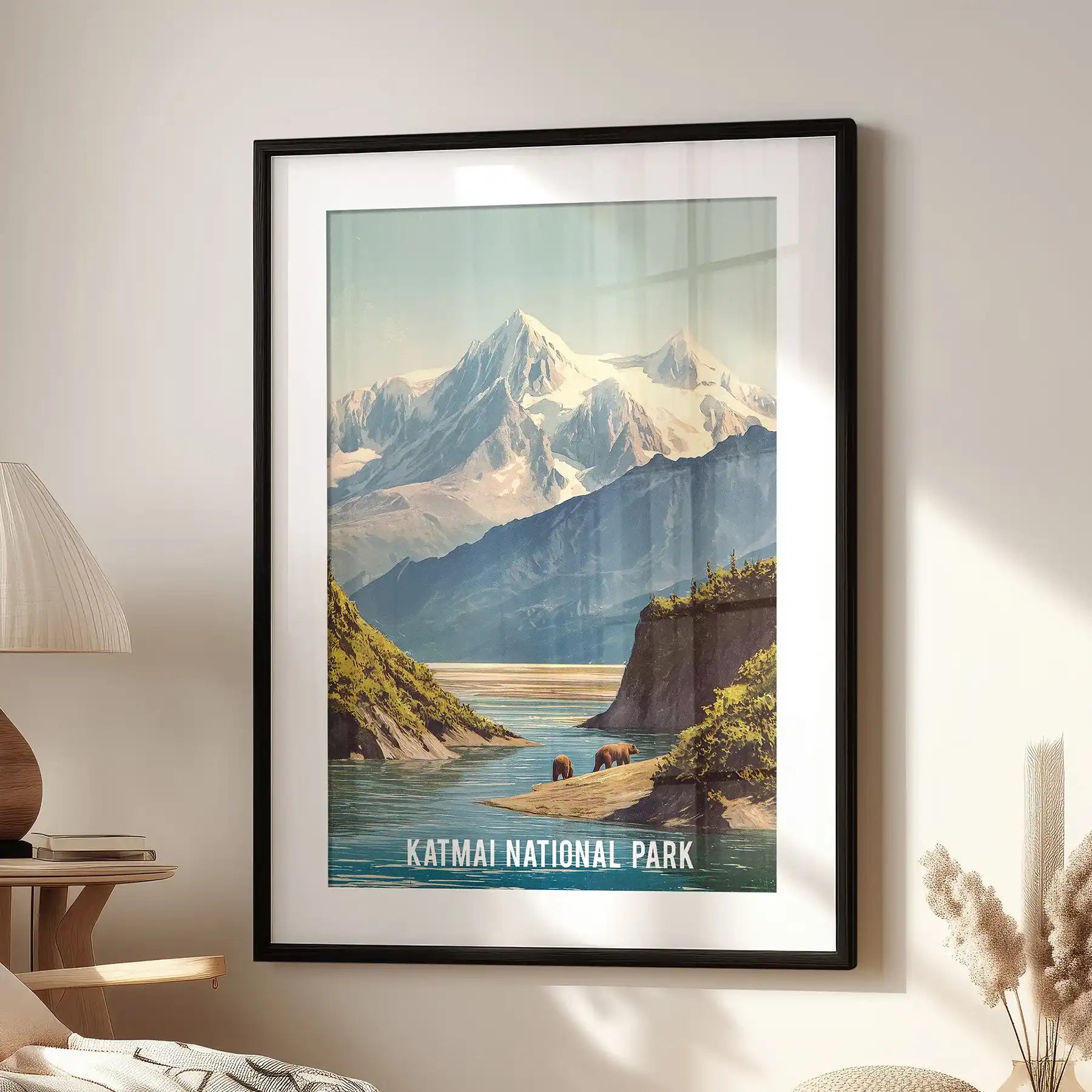 A grizzly bear wall picture in a matted black frame, perched above an accent chair for a crisp touch of Katmai’s rugged wilderness.