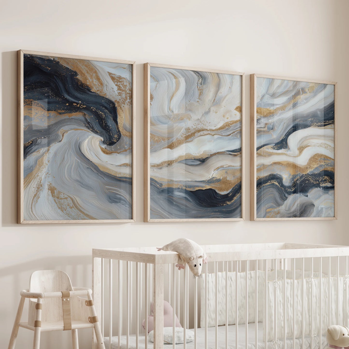 Blue-beige modern abstract painting as three wood-framed prints brings soft color to the nursery wall over the cot, with gentle movement.