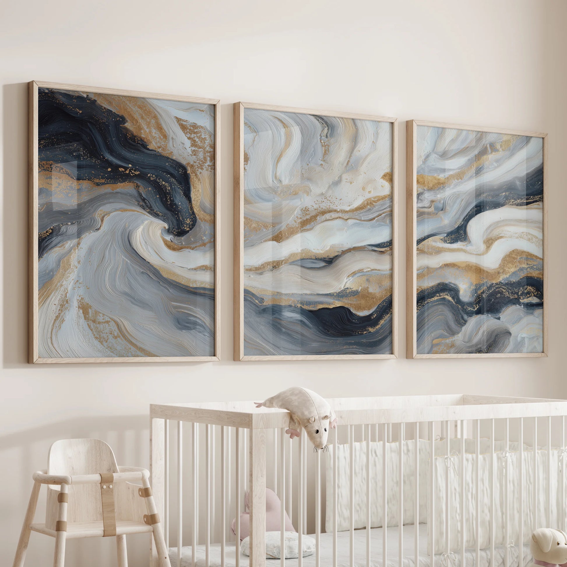 Blue-beige modern abstract painting as three wood-framed prints brings soft color to the nursery wall over the cot, with gentle movement.