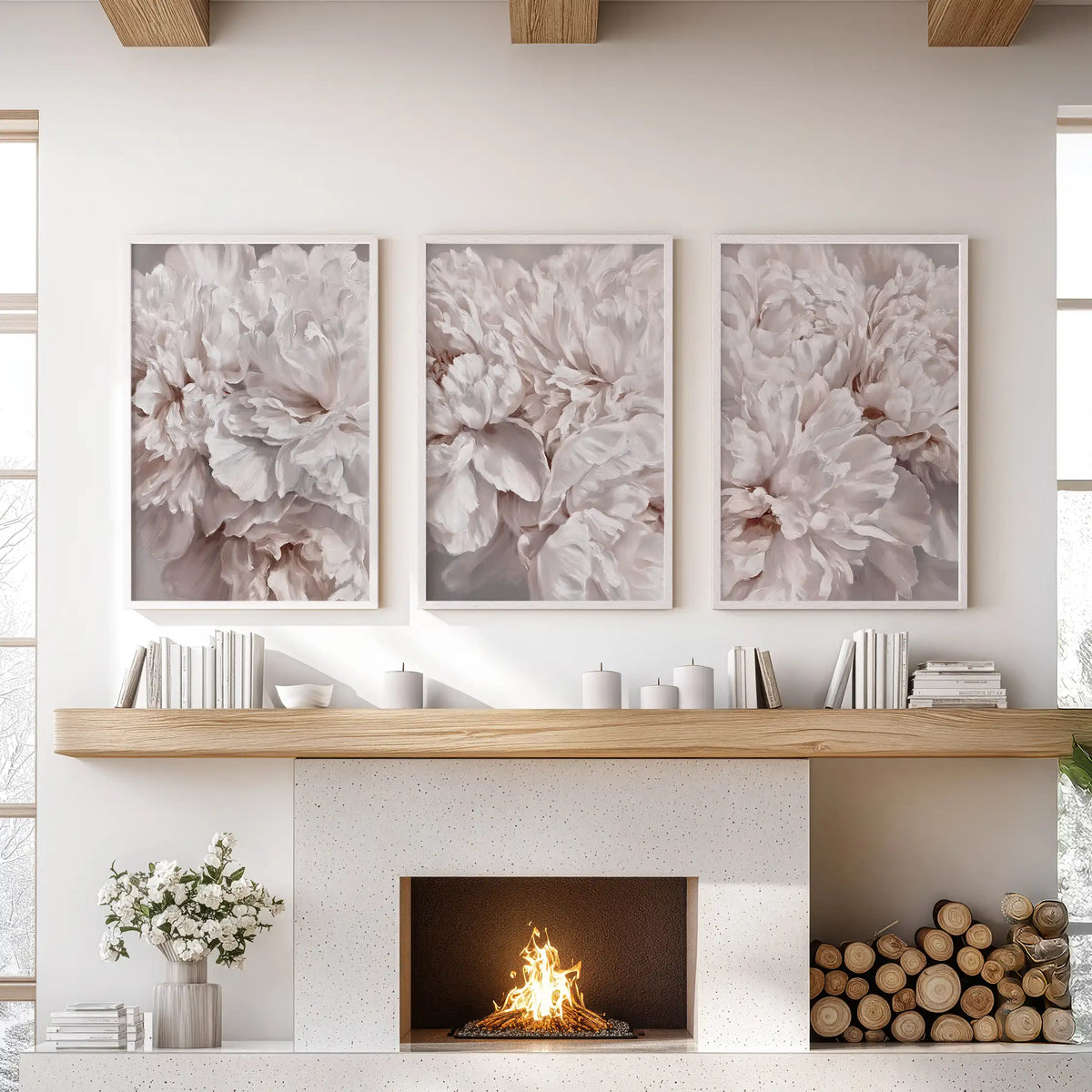 White frames surround three peony close-ups above the fireplace mantel, showing pale pink petals and deeper taupe folds.