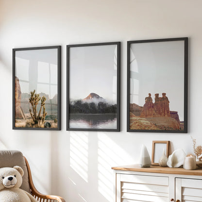 Three black-framed wall prints of red rock cliffs and mesas bring sunlit desert tones to the playroom above the dresser.