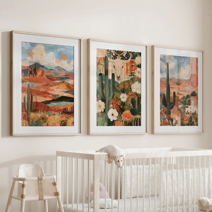 Three ranch landscape wall hangings sit softly above the nursery bassinet, with oak matted frames warming the sunbaked range tones.