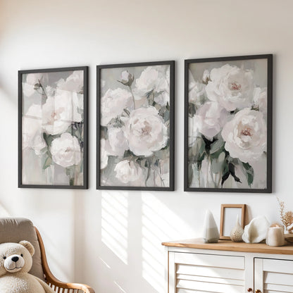Summer garden blooms in a three-print wall art set, black frames lined above the kids room dresser to sprinkle color and gentle, playful florals.