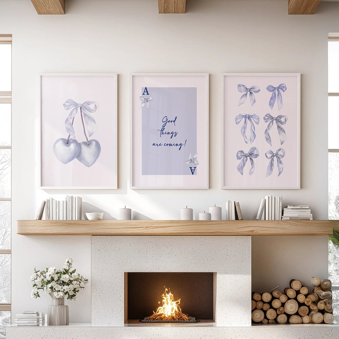 A trio of light blue bow prints framed in white hangs above the hearth, lending a gentle, coquette accent to the relaxed lounge.