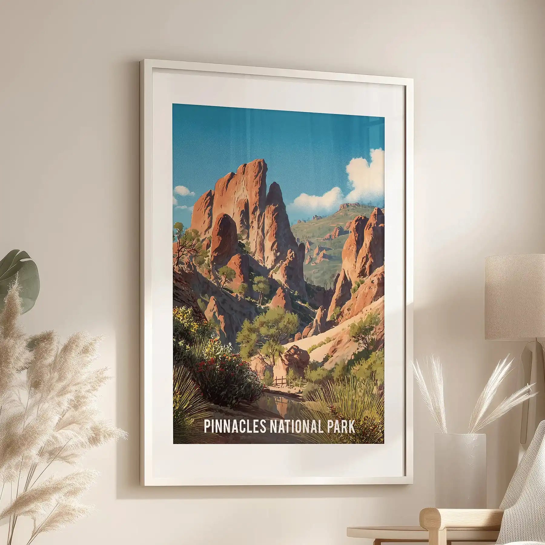 One-panel travel poster print of a California park sits in a white frame with matting, balanced above the living room lounge for a fresh finish.