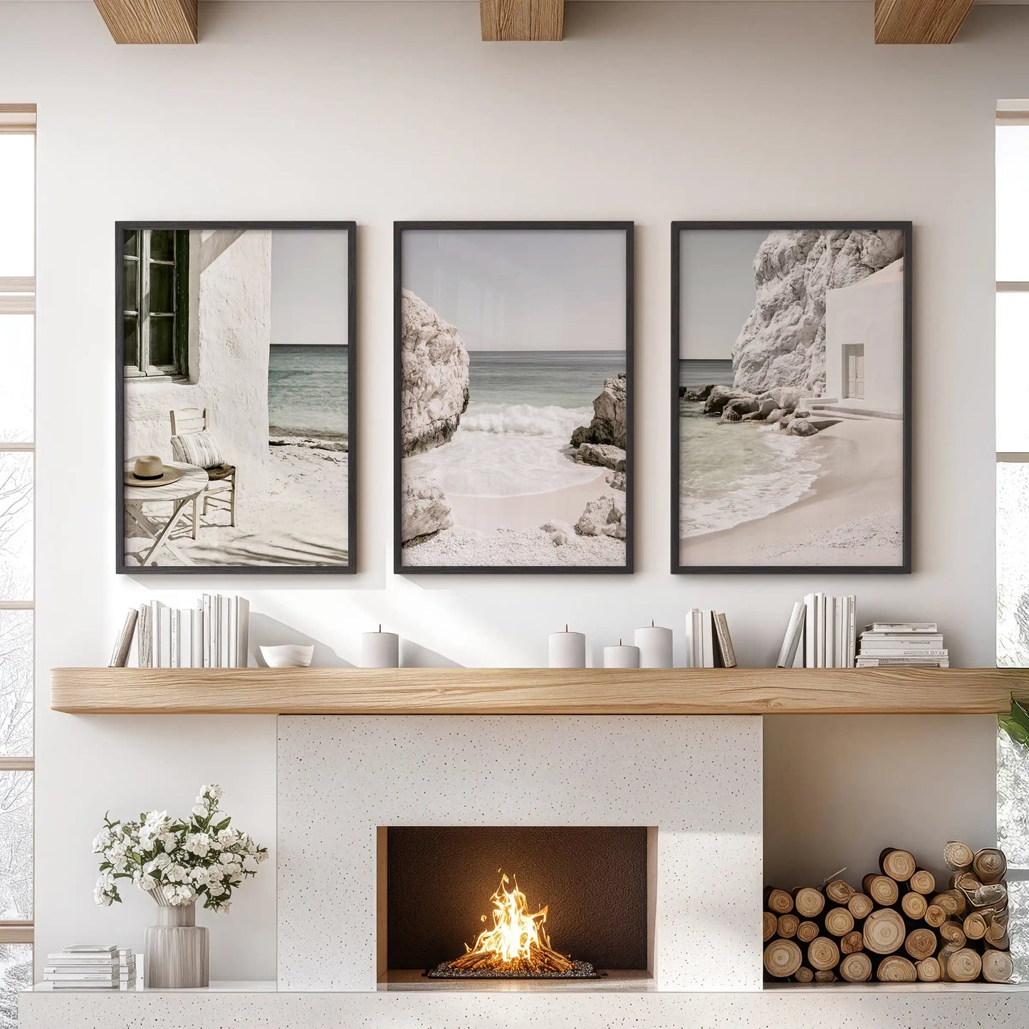 Calm shoreline photography, 3-piece wall art set in black frames, hangs above the mantle to bring airy coastal texture to the living room.
