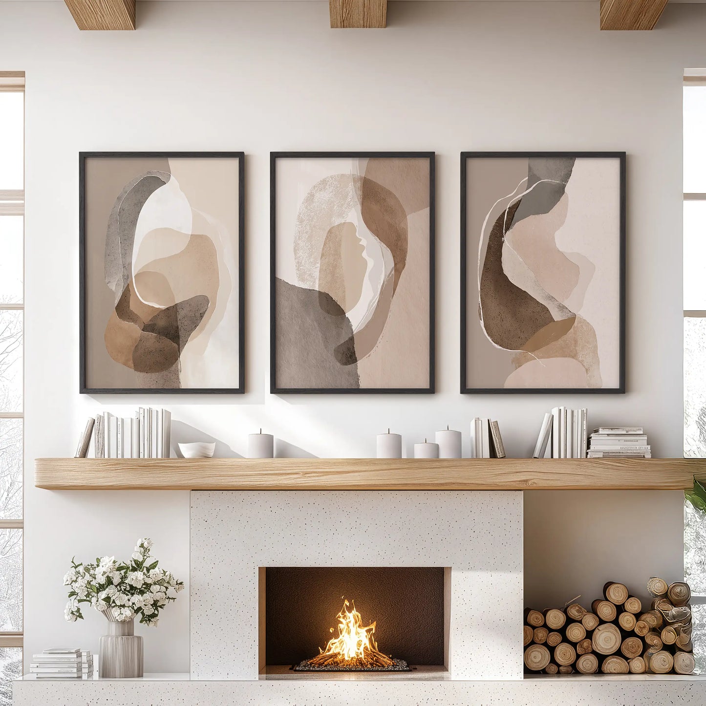 Boho abstract shapes set of 3 wall prints, black framed, hang centered above the hearth to ground a living room with warm beige and brown earth tones.