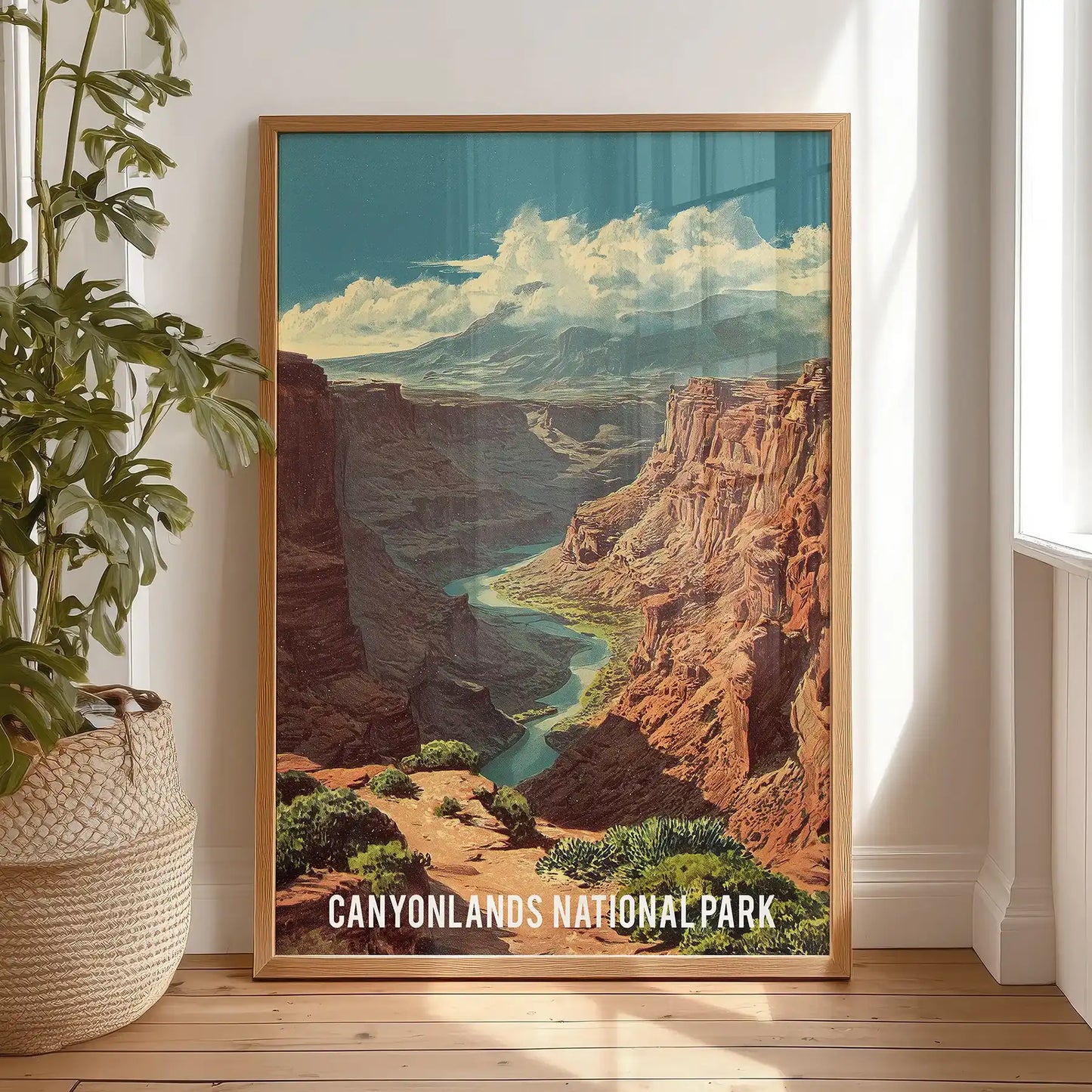 Canyonlands National Park landscape single wall print in a natural wood frame leans casually in the bedroom when placed on the floor.