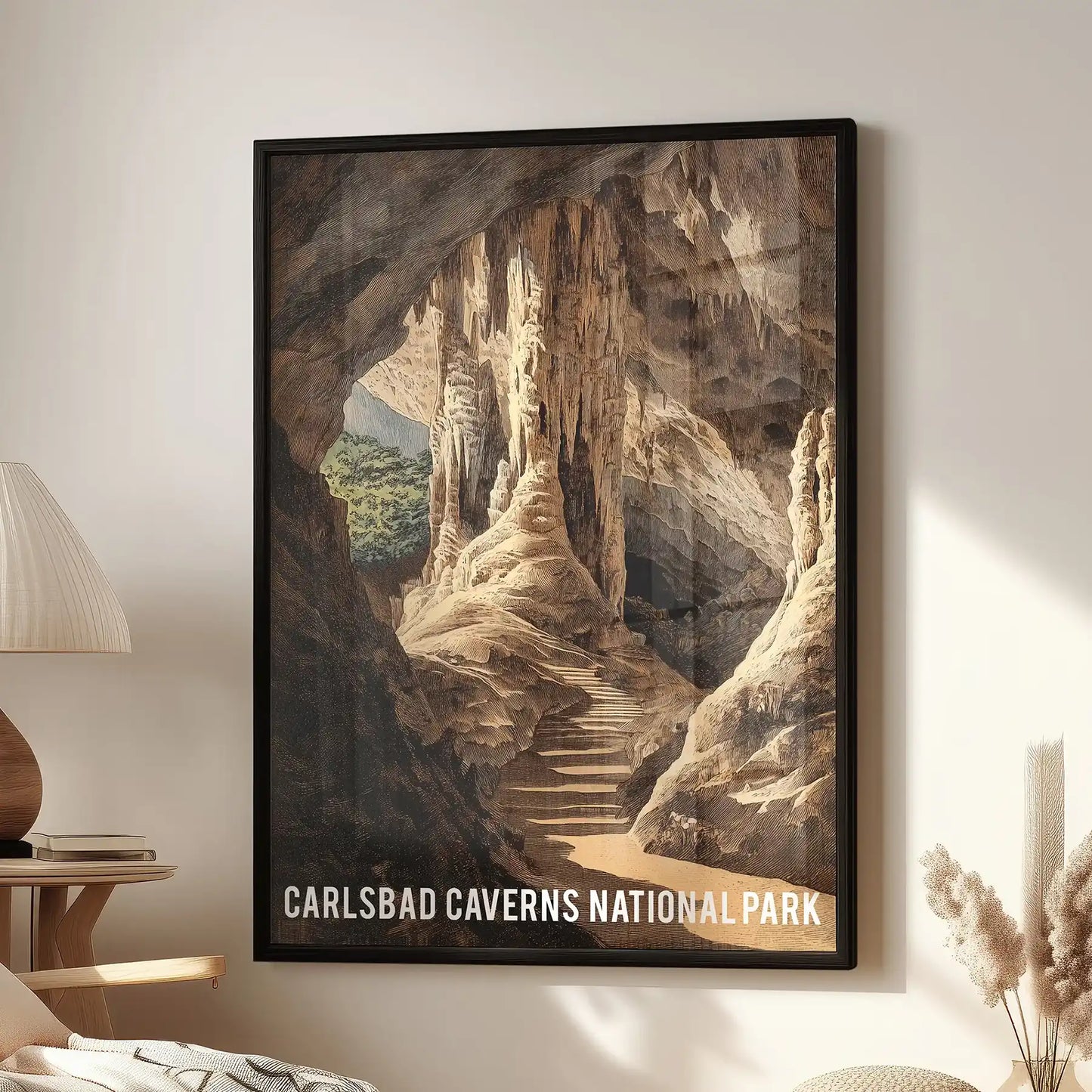A black-framed wall art print of limestone cave formations hangs above the family-room armchair, giving the space a sense of glowing cavern depth.