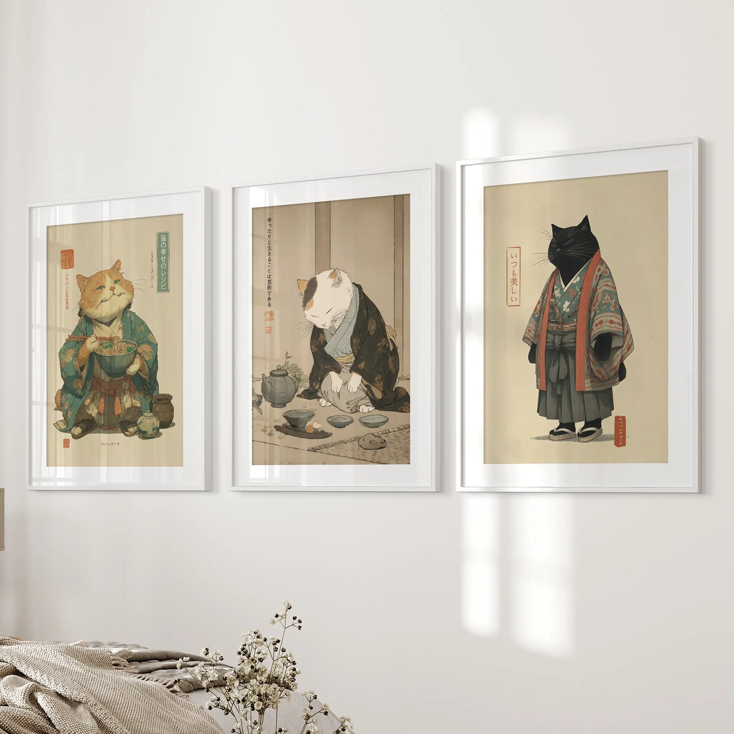 A 3-piece set of white-matted frames shows a black cat enjoying ramen, bringing crisp lines and cozy humor to the bedroom wall.