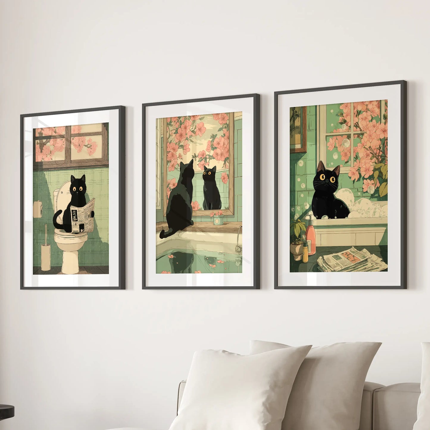 Toilet-reading black cat illustration, 3-piece art print set, shown in a black frame with a wide mat behind the couch in the living room.