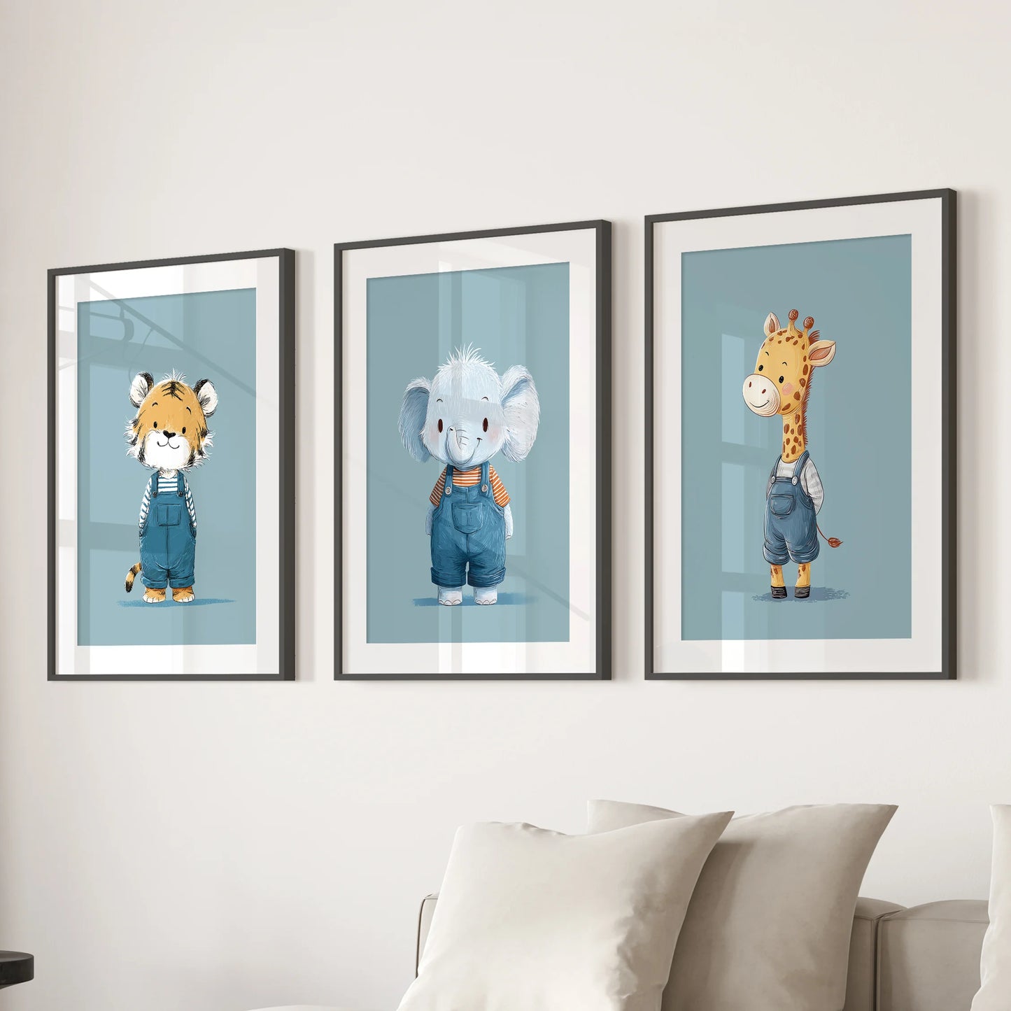 Three jungle animal art posters with black mats and frames bring soft blue color to the family room wall above the couch.