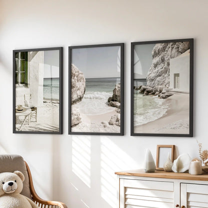 Minimalist ocean scenes, print trio set in black frames, sit above the dresser to soften a kids room with gentle sand, surf, and horizon lines.