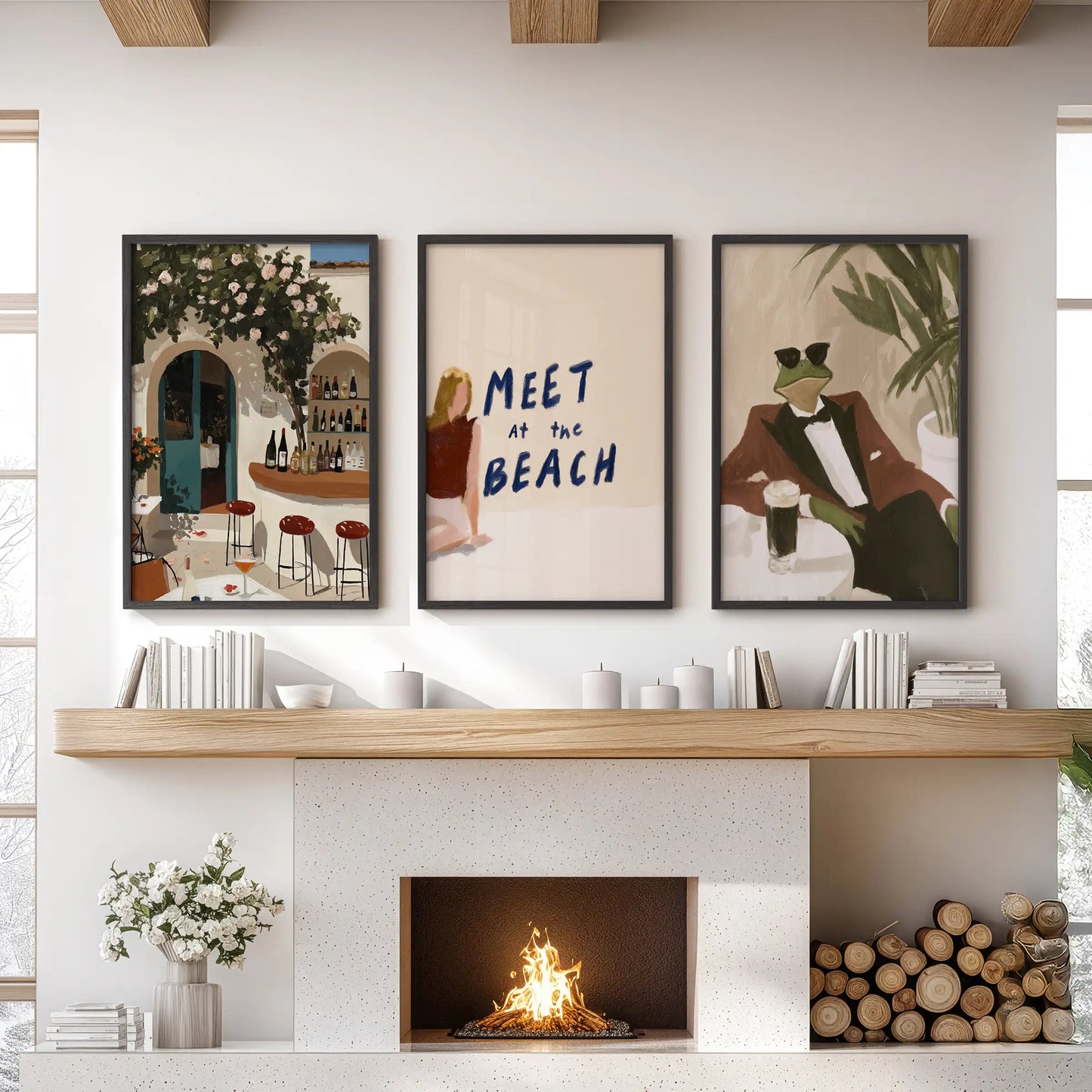 Mediterranean beach wall art, a set of three black-framed prints, brings breezy coastal color to the sitting room above the mantelpiece.