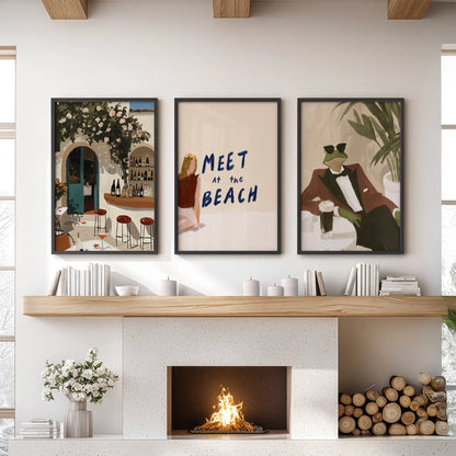 Mediterranean beach wall art, a set of three black-framed prints, brings breezy coastal color to the sitting room above the mantelpiece.
