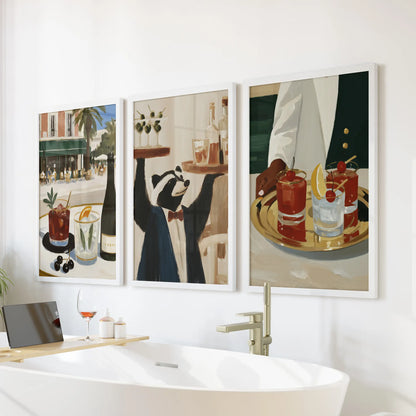 Three-piece wall art set featuring cocktail gallery art, displayed in white frames over a bathroom bath.