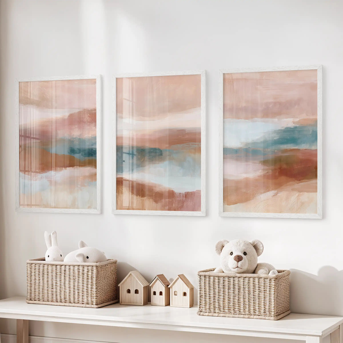 A three-piece wall print set of soft geometric shapes hangs in white frames above the toy organizer, brightening the children's room.